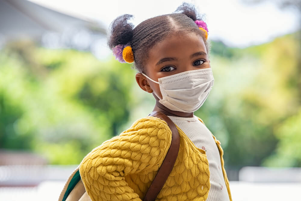 A child With Face Mask